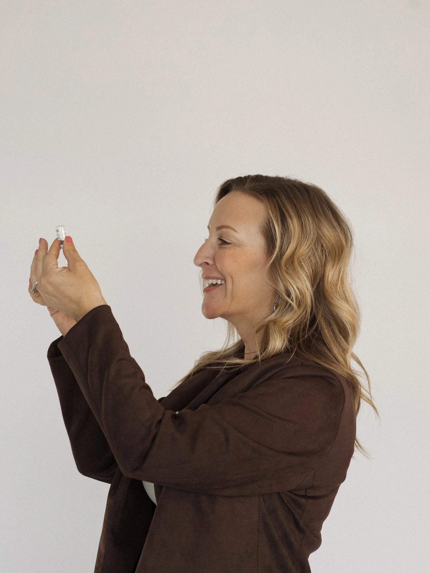 Cassie Duncan reviewing an injectable vial